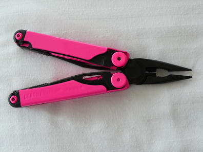 Hot pink powdercoated Leatherman front view pliers